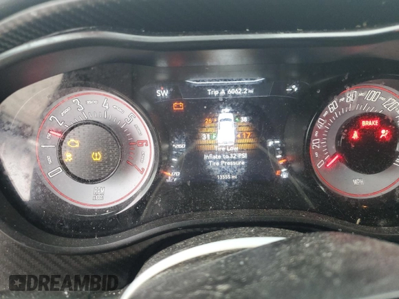 2023 Dodge Challenger R/T Scat Pack Widebody z VIN 2C3CDZFJ6PH593668, wystawiony jako Copart lot #45582495 z przebiegiem 13 555 mil mil oraz Szkoda całkowita • Salvage title. Historia ofert i sprzedaży dostępna na DreamBid. Obrazek 9.