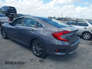 2021 Honda Civic Sedan EX with VIN 19XFC1F34ME001481, listed as a IAAI auction lot 41943440 with 35,851 mi miles. Bid and sale history available at carsss.com. Image 3.