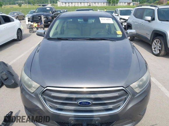 2013 Ford Taurus Limited z VIN 1FAHP2F8XDG185782, wystawiony jako IAAI lot #42474018 z przebiegiem 181 144 mil mil oraz . Historia ofert i sprzedaży dostępna na DreamBid. Obrazek 12.