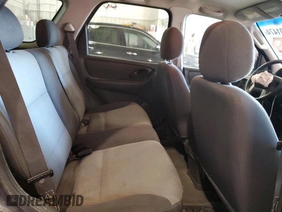 2004 Ford Escape XLS with VIN 1FMYU92154KA14600, listed as a Copart auction lot 83101474 with 305,444 mi miles and Salvage Title. Bid and sale history available at DreamBid. Image 11.