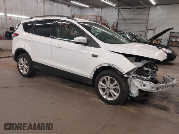 2018 Ford Escape SE z VIN 1FMCU9GD2JUB17518, wystawiony jako IAAI lot #41919245 z przebiegiem 102 626 mil mil oraz . Historia ofert i sprzedaży dostępna na DreamBid. Obrazek 1.