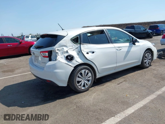 2018 Subaru Impreza with VIN 4S3GTAA64J3717886, listed as a IAAI auction lot 42572412 with 91,911 mi miles and . Bid and sale history available at DreamBid. Image 4.