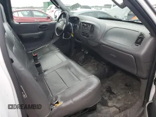 2003 Ford F-150 XL with VIN 1FTRF18W03NA77544, listed as a Copart auction lot 84805894 with Not provided miles and Salvage title. Bid and sale history available at DreamBid. Image 10.