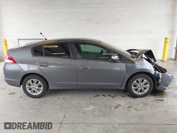 2010 Honda Insight EX with VIN JHMZE2H7XAS034098, listed as a IAAI auction lot 41939869 with 281,689 mi miles and . Bid and sale history available at DreamBid. Image 13.