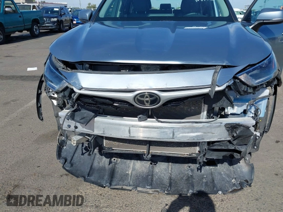 2021 Toyota Highlander XLE with VIN 5TDHZRBH2MS124631, listed as a IAAI auction lot 42660410 with 84,306 mi miles and . Bid and sale history available at DreamBid. Image 6.