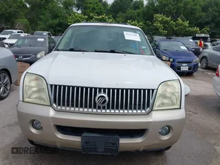 2004 Mercury Mountaineer Convenience z VIN 4M2ZU86K14ZJ19996, wystawiony jako IAAI lot #42297885 z przebiegiem 230 508 mil mil oraz . Historia ofert i sprzedaży dostępna na DreamBid. Obrazek 6.