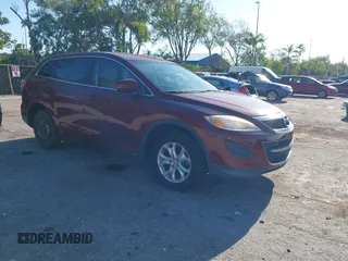 2011 Mazda CX-9 Touring with VIN JM3TB2CA6B0328864, listed as a IAAI auction lot 42029203 with 98,022 mi miles and . Bid and sale history available at DreamBid. Image 1.