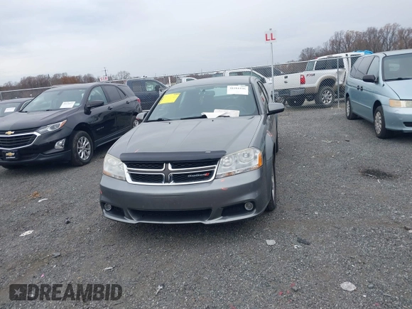 2013 Dodge Avenger SXT with VIN 1C3CDZCB6DN568480, listed as a IAAI auction lot 38104186 with 129,203 mi miles and . Bid and sale history available at DreamBid. Image 12.