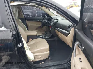 2012 Kia Sorento EX with VIN 5XYKUDA2XCG301636, listed as a IAAI auction lot 41619793 with 220,692 mi miles. Bid and sale history available at carsss.com. Image 5.