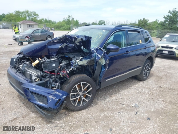 2021 Volkswagen Tiguan SE with VIN 3VV2B7AXXMM084355, listed as a IAAI auction lot 39559023 with 1 mi miles. Bid and sale history available at carsss.com. Image 2.