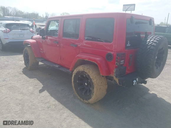 2012 Jeep Wrangler Unlimited Sahara with VIN 1C4HJWEGXCL209449, listed as a IAAI auction lot 41864432 with 100,917 mi miles. Bid and sale history available at carsss.com. Image 3.