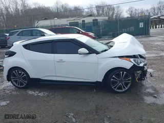 2016 Hyundai Veloster Turbo with VIN KMHTC6AE6GU275727, listed as a IAAI auction lot 41743920 with 94,893 mi miles. Bid and sale history available at carsss.com. Image 13.