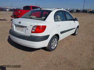 2008 Kia Rio LX with VIN KNADE123286297729, listed as a IAAI auction lot 42007714 with 51,268 mi miles. Bid and sale history available at carsss.com. Image 4.
