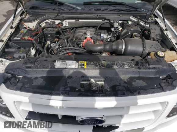 2002 Ford F-150 XL with VIN 1FTRF17212KC06180, listed as a Copart auction lot 45336625 with 214,139 mi miles and Salvage title. Bid and sale history available at DreamBid. Image 11.