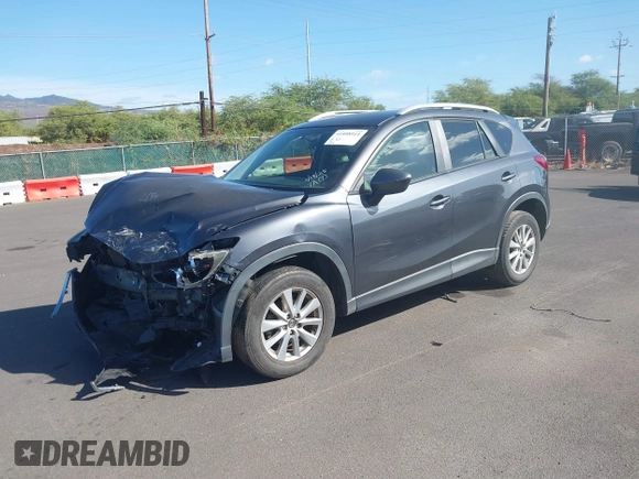2014 Mazda CX-5 Sport with VIN JM3KE2BE4E0414721, listed as a IAAI auction lot 41408914 with Not Provided miles and . Bid and sale history available at carsss.com. Image 17.