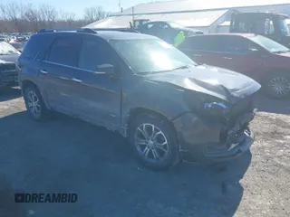 2014 GMC Acadia SLT z VIN 1GKKVRKDXEJ284385, wystawiony jako IAAI lot #41622670 z przebiegiem 220 405 mil mil oraz . Historia ofert i sprzedaży dostępna na DreamBid. Obrazek 1.