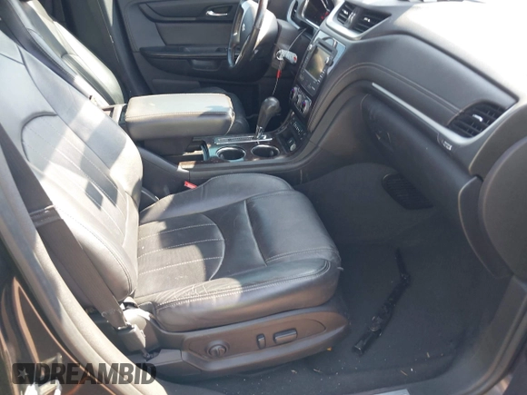 2016 Chevrolet Traverse LTZ z VIN 1GNKRJKD1GJ301277, wystawiony jako IAAI lot #41884629 z przebiegiem 106 338 mil mil oraz . Historia ofert i sprzedaży dostępna na DreamBid. Obrazek 5.