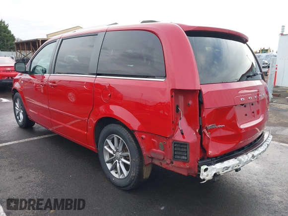 2014 Dodge Grand Caravan SXT with VIN 2C4RDGCG3ER257695, listed as a IAAI auction lot 41534568 with 116,896 mi miles and . Bid and sale history available at DreamBid. Image 3.