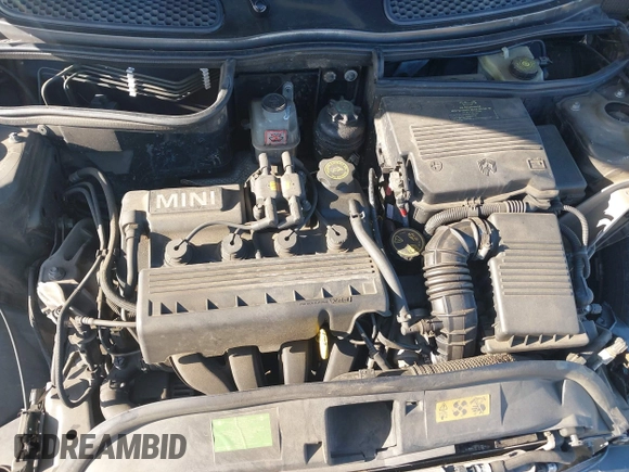 2006 MINI Hardtop with VIN WMWRC33586TJ75043, listed as a IAAI auction lot 41948235 with 138,402 mi miles and . Bid and sale history available at DreamBid. Image 10.