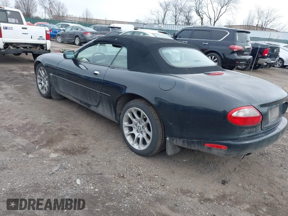 1997 Jaguar XK with VIN SAJGX274XVC017622, listed as a IAAI auction lot 41614339 with 94,298 mi miles and . Bid and sale history available at DreamBid. Image 3.