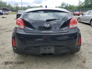 2013 Hyundai Veloster w/Gray Int z VIN KMHTC6AD2DU106887, wystawiony jako Copart lot #58149635 z przebiegiem 159 914 mil mil oraz Szkoda całkowita • Salvage title. Historia ofert i sprzedaży dostępna na DreamBid. Obrazek 6.