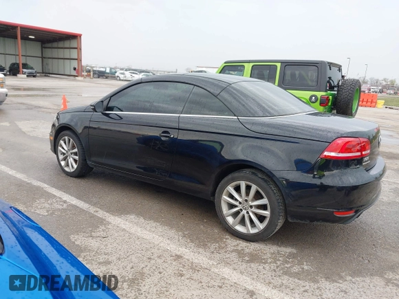 2014 Volkswagen Eos Komfort with VIN WVWBW8AH4EV007229, listed as a IAAI auction lot 41894160 with 66,984 mi miles and . Bid and sale history available at DreamBid. Image 14.