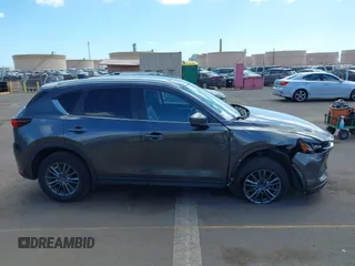 2021 Mazda CX-5 Touring with VIN JM3KFACM2M1348305, listed as a IAAI auction lot 41627199 with 30,044 mi miles. Bid and sale history available at carsss.com. Image 14.
