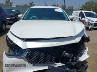 2021 Mazda CX-30 Select with VIN 3MVDMBBL9MM313039, listed as a IAAI auction lot 42575424 with 21,083 mi miles and . Bid and sale history available at DreamBid. Image 12.