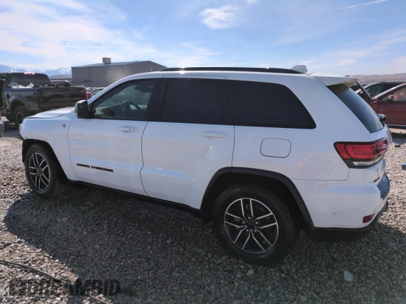 2021 Jeep Grand Cherokee Trailhawk with VIN 1C4RJFLG4MC703945, listed as a Copart auction lot 50703085 with 57,109 mi miles and Salvage Title. Bid and sale history available at carsss.com. Image 2.