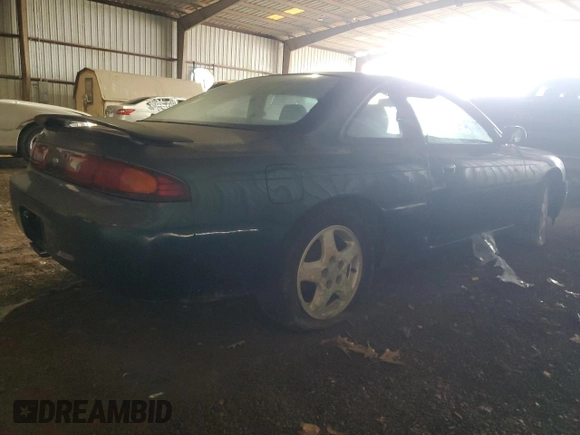 1995 Nissan 240SX z VIN JN1AS44D6SW020744, wystawiony jako Copart lot #64406924 z przebiegiem 87 165 mil mil oraz Szkody całkowita. Historia ofert i sprzedaży dostępna na DreamBid. Obrazek 3.