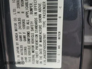 2012 Acura TSX z VIN JH4CU2F4XCC007997, wystawiony jako Copart lot #59993885 z przebiegiem 124 287 mil mil oraz Szkoda całkowita • Salvage title. Historia ofert i sprzedaży dostępna na DreamBid. Obrazek 12.