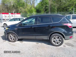 2017 Ford Escape SE with VIN 1FMCU9G91HUB56073, listed as a IAAI auction lot 42130463 with 94,275 mi miles and . Bid and sale history available at carsss.com. Image 14.