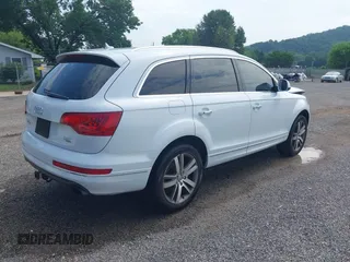 2014 Audi Q7 Premium Plus with VIN WA1LGAFE6ED015856, listed as a IAAI auction lot 42612500 with 96,946 mi miles and . Bid and sale history available at DreamBid. Image 4.