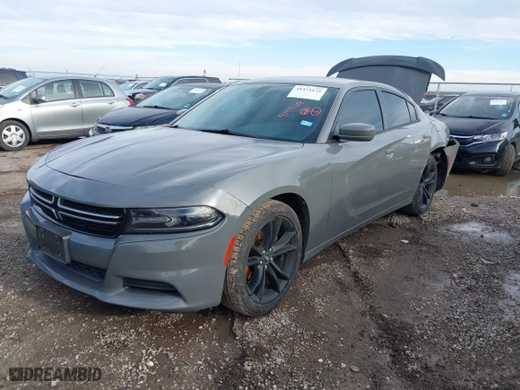 2017 Dodge Charger SE with VIN 2C3CDXBG8HH654518, listed as a IAAI auction lot 41471172 with 116,553 mi miles. Bid and sale history available at carsss.com. Image 2.
