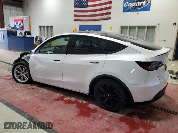 2023 Tesla Model Y Long Range with VIN 7SAYGDEE8PF758841, listed as a Copart auction lot 62851164 with 16,811 mi miles and Non Repairable. Bid and sale history available at DreamBid. Image 2.