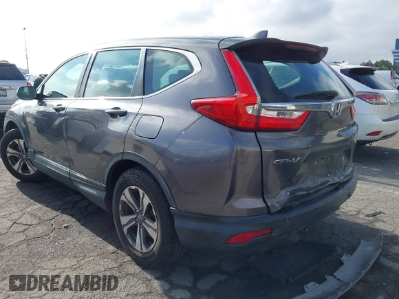 2018 Honda CR-V LX with VIN 2HKRW5H36JH426040, listed as a IAAI auction lot 42031936 with 94,564 mi miles. Bid and sale history available at carsss.com. Image 3.