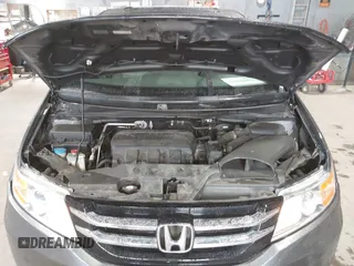 2012 Honda Odyssey EX-L with VIN 5FNRL5H63CB137198, listed as a IAAI auction lot 42706690 with 305,753 mi miles and . Bid and sale history available at DreamBid. Image 10.
