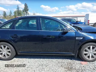 2008 Ford Taurus SEL with VIN 1FAHP24W98G140677, listed as a IAAI auction lot 42087217 with 151,693 mi miles. Bid and sale history available at carsss.com. Image 13.