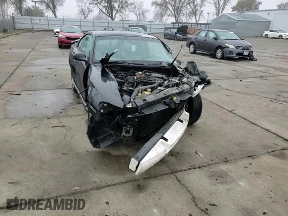 1997 Ford Mustang with VIN 1FALP4049VF136060, listed as a Copart auction lot 85389824 with 0 mi miles and Salvage Title. Bid and sale history available at carsss.com. Image 11.