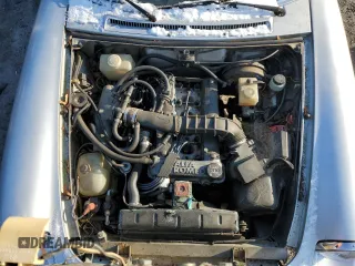 1986 Alfa Romeo Spider Veloce z VIN ZARBA5419G1040612, wystawiony jako Copart lot #42347965 z przebiegiem 84 485 mil mil oraz Czysty tytuł • Clean title. Historia ofert i sprzedaży dostępna na DreamBid. Obrazek 11.