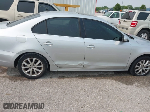 2013 Volkswagen Jetta SE z VIN 3VWDP7AJ0DM365243, wystawiony jako IAAI lot #42400011 z przebiegiem 191 746 mil mil oraz . Historia ofert i sprzedaży dostępna na DreamBid. Obrazek 12.