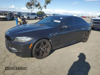 2014 BMW M5 with VIN WBSFV9C55ED593760, listed as a Copart auction lot 49070765 with 128,365 mi miles and Clean Title. Bid and sale history available at carsss.com. Image 1.
