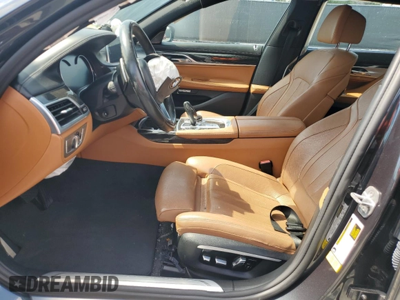 2017 BMW 7 Series 740i with VIN WBA7E2C53HG739365, listed as a Copart auction lot 58234325 with Not provided miles and Salvage title. Bid and sale history available at DreamBid. Image 7.