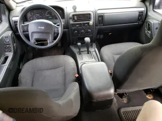 2004 Jeep Grand Cherokee Laredo with VIN 1J4GW48S64C262632, listed as a Copart auction lot 55175415 with 153,401 mi miles and Clean Title. Bid and sale history available at carsss.com. Image 8.