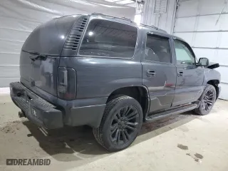 2004 GMC Yukon Denali with VIN 1GKEK63U34J326848, listed as a Copart auction lot 49014285 with 225,388 mi miles and Salvage Title. Bid and sale history available at carsss.com. Image 3.