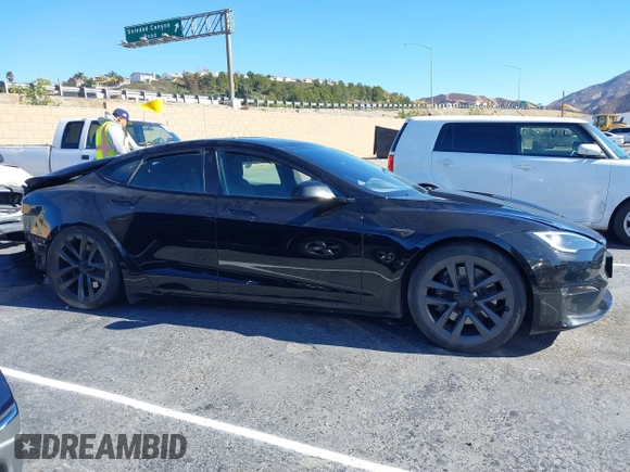 2022 Tesla Model S with VIN 5YJSA1E52NF476906, listed as a IAAI auction lot 41320074 with Not Provided miles and . Bid and sale history available at DreamBid. Image 12.