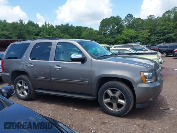 2012 Chevrolet Tahoe LT with VIN 1GNSCBE09CR229417, listed as a IAAI auction lot 42507793 with 164,877 mi miles and . Bid and sale history available at DreamBid. Image 13.