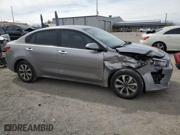 2023 Kia Rio S with VIN 3KPA24AD1PE552714, listed as a Copart auction lot 49243375 with 50,657 mi miles and Salvage Title. Bid and sale history available at carsss.com. Image 4.