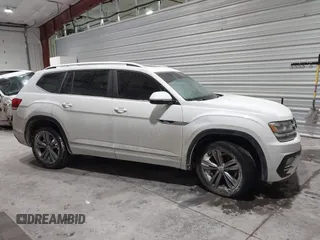 2019 Volkswagen Atlas SE z VIN 1V2XR2CA0KC595596, wystawiony jako IAAI lot #41410019 z przebiegiem 103 336 mil mil oraz . Historia ofert i sprzedaży dostępna na DreamBid. Obrazek 14.
