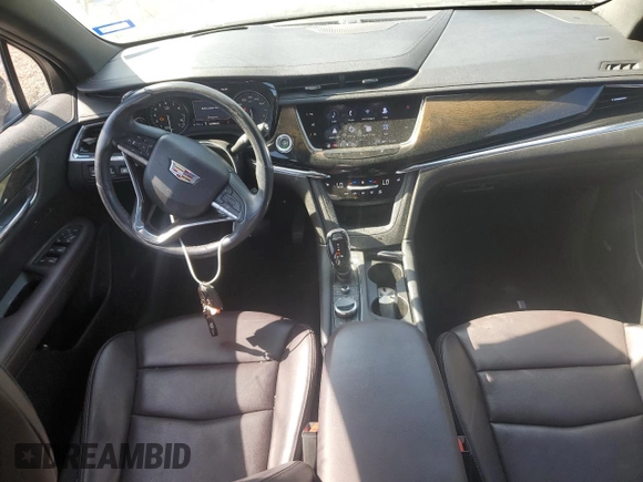 2021 Cadillac XT6 Premium Luxury with VIN 1GYKPCRS4MZ199110, listed as a Copart auction lot 51798905 with 66,486 mi miles and Salvage Title. Bid and sale history available at DreamBid. Image 8.